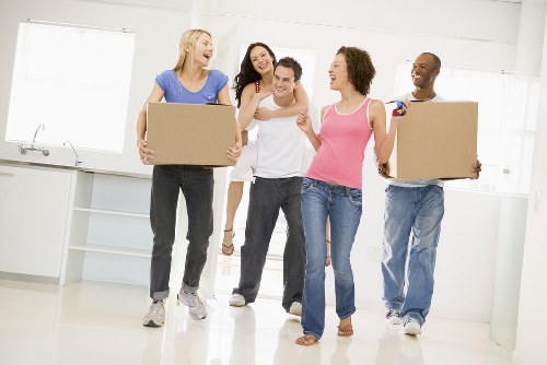 Office removals team planning a move in Spitalfields with desks and boxes