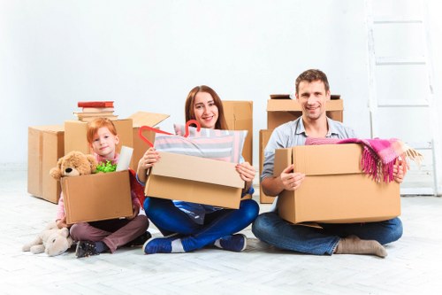 Local moving team handling boxes and items in Spitalfields