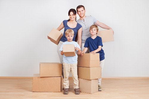 Commercial movers relocating office items in Spitalfields
