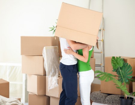 Local removals team handling furniture in Spitalfields