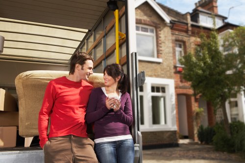 Moving boxes and household items in a Spitalfields apartment move